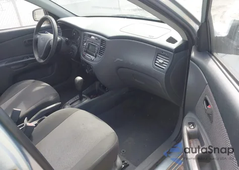 2009 Kia Rio Lx z USA, uszkodzony, nr VIN KNADE223796476940